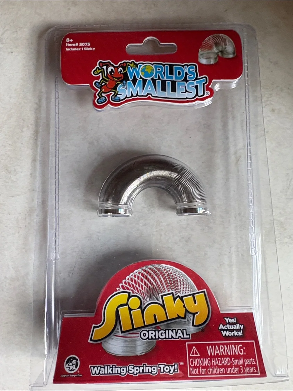 BNIB World's Smallest Slinky (really works)
